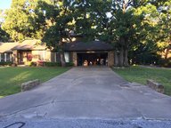 Old cracked driveway before replacement Tulsa Oklahoma