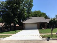 Tulsa driveway replacement project before and after installation