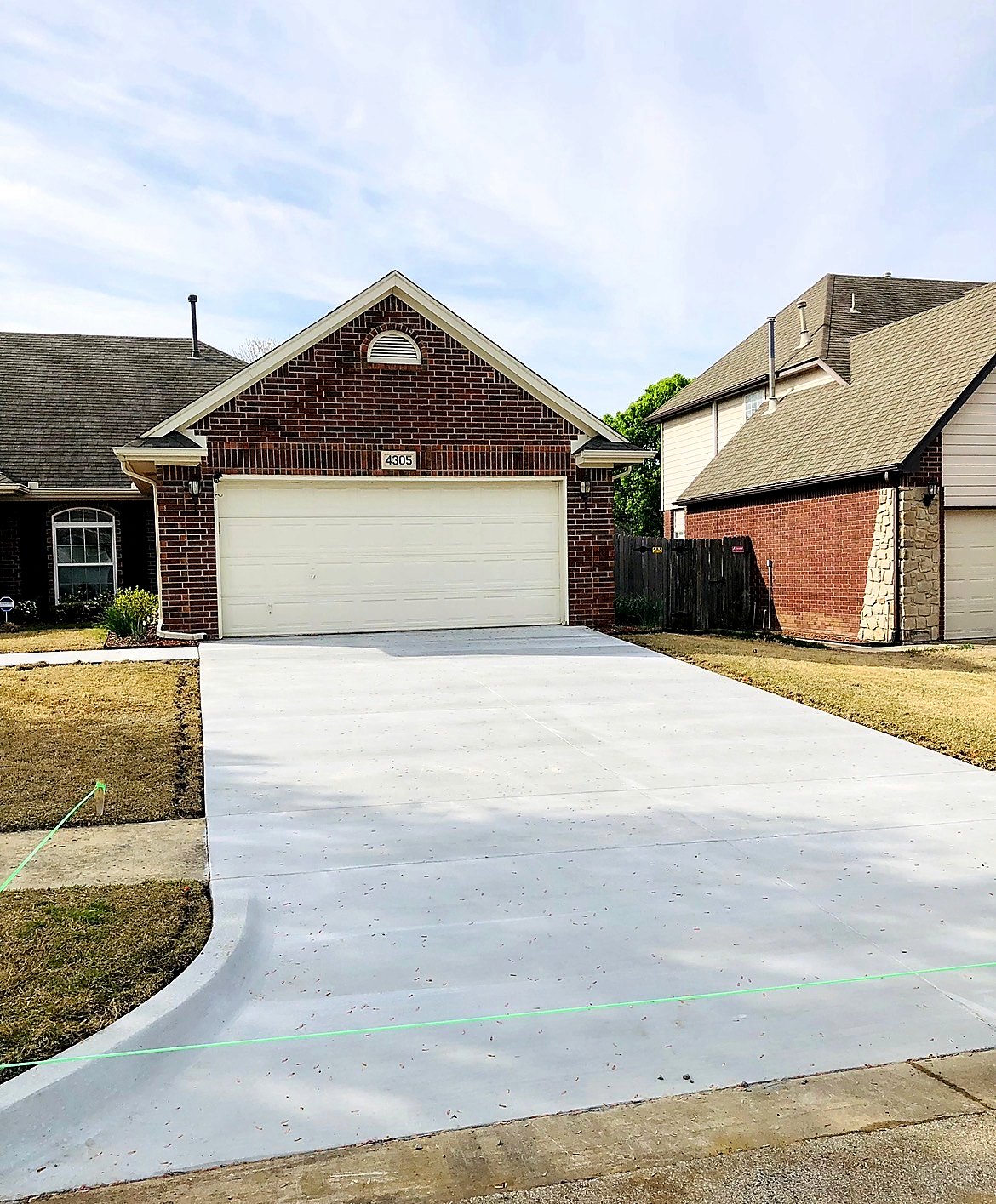 Brick home driveway replacement in Tulsa